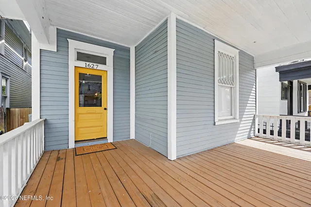 a view of a house with wooden floor