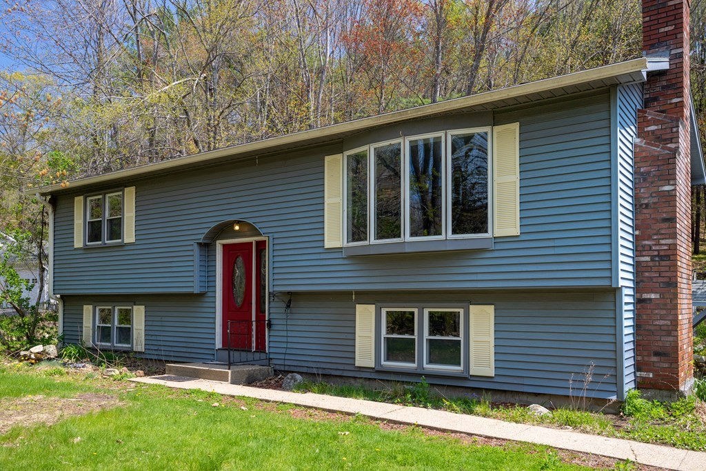 1 Needham Road Westminster, MA 01473 - Photo 1 of 42 a view of a house with a yard and large tree