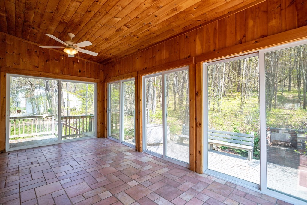 1 Needham Road Westminster, MA 01473 - Photo 15 of 42 a big room with chandelier fan and windows