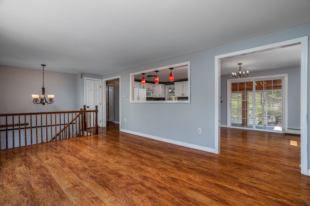 1 Needham Road Westminster, MA 01473 - Photo 18 of 42 a view of a big room with wooden floor and windows