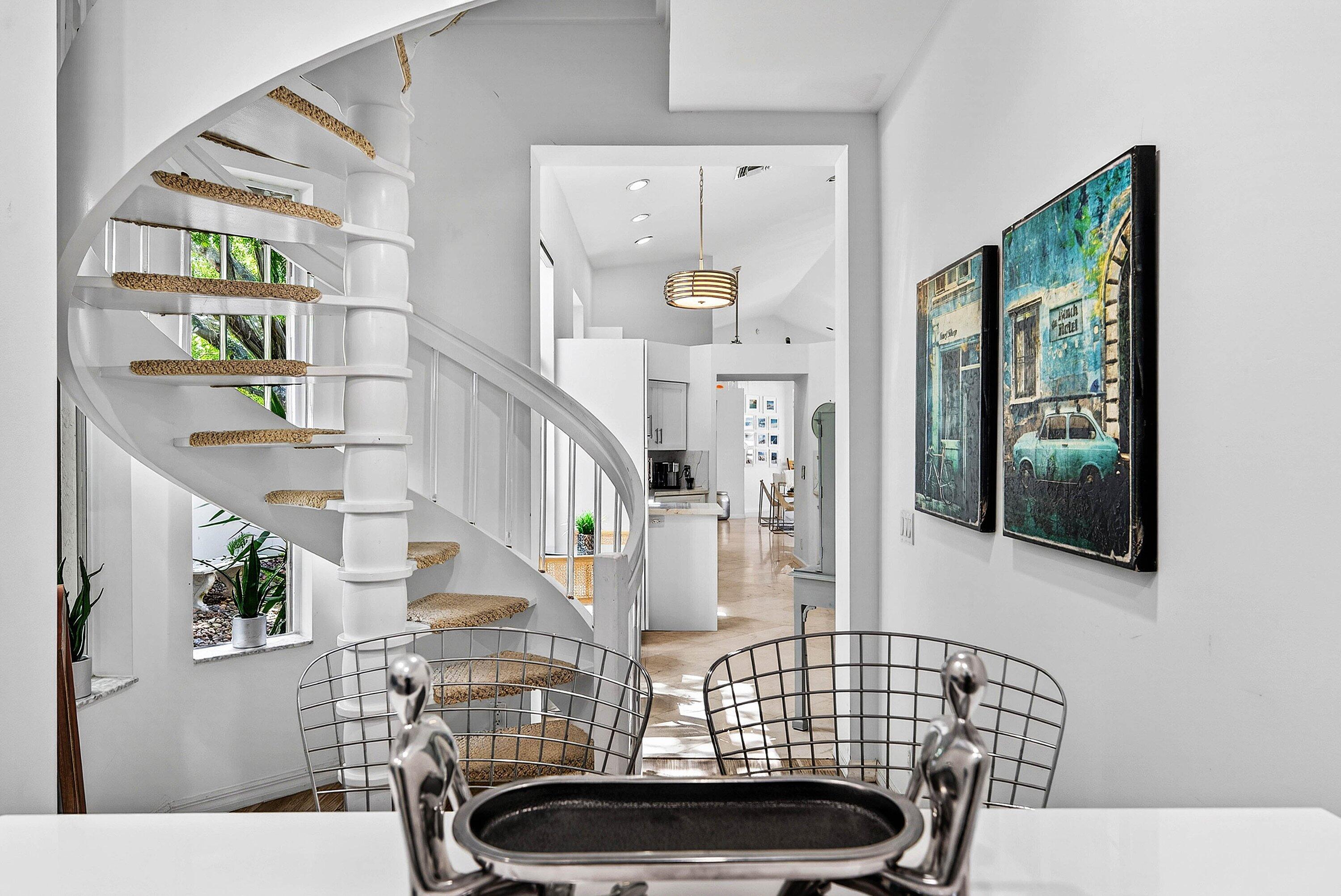 6601 Northwest 26th Way Boca Raton, FL 33496 - Photo 14 of 26 a view of hall way with furniture and chandelier