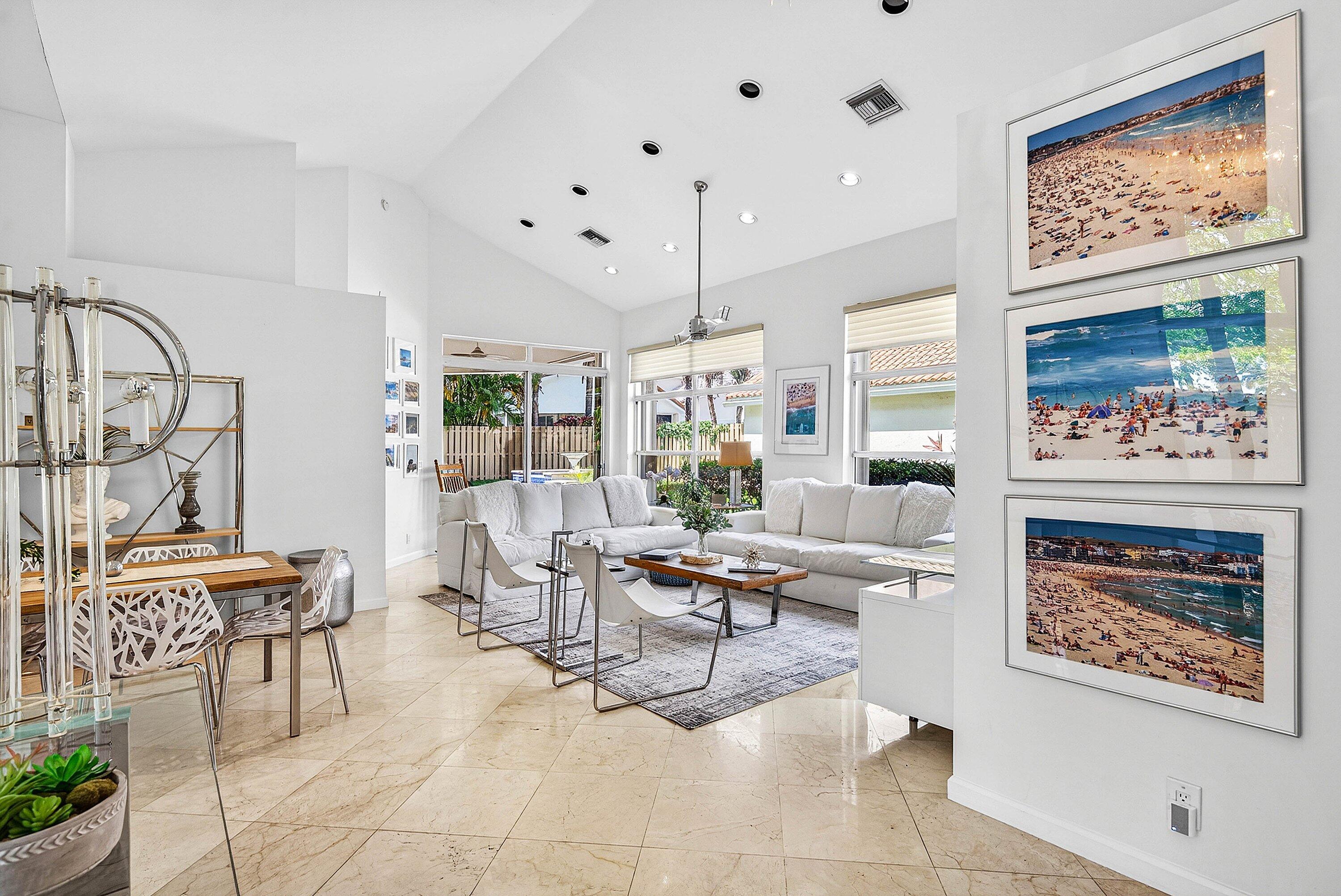6601 Northwest 26th Way Boca Raton, FL 33496 - Photo 3 of 26 a living room with furniture and a painting