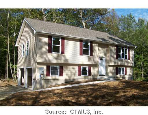 102 Kendall Road Lisbon, CT 06351 - Photo 1 of 1 Exterior Front. Under construction, brand new 3 bedrooms, 2 baths, 2 car garage. Concrete walkway to front door. Quality throughout.