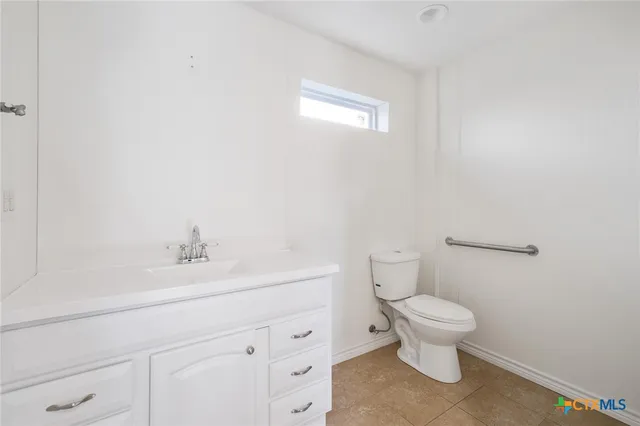 a view of livingroom with furniture and windows