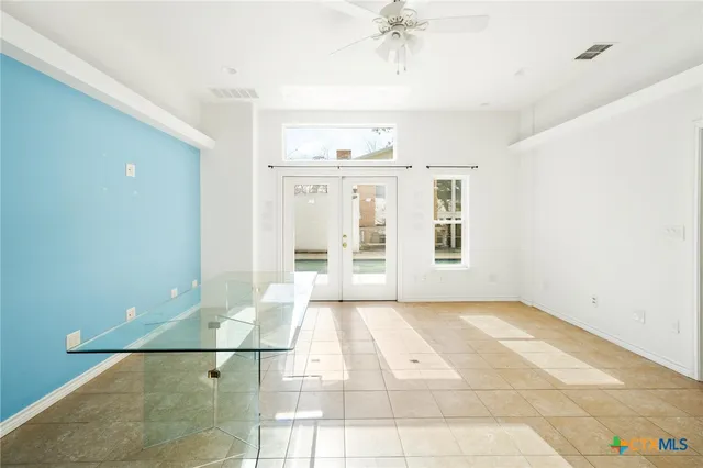 a kitchen with stainless steel appliances granite countertop a sink and a stove