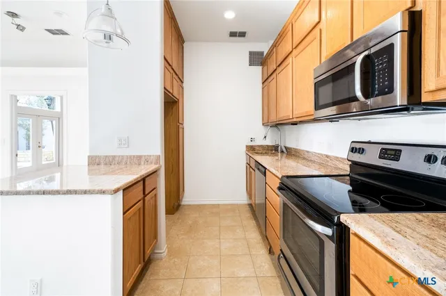a front view of a house with swimming pool