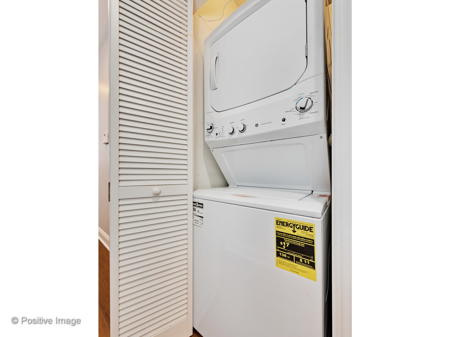 526 North May Street, Unit 1 Chicago, IL 60642 - Photo 14 of 15 a close up view of a utility room with dryer and washer