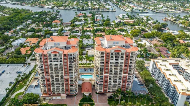 a view of a brick building with large windows