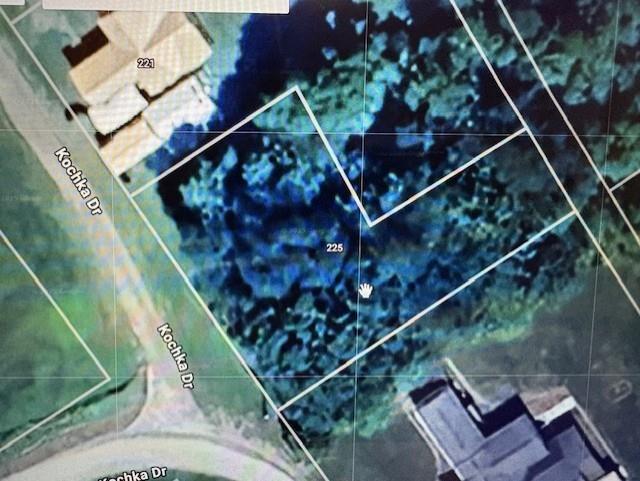 a view of balcony with wooden floor