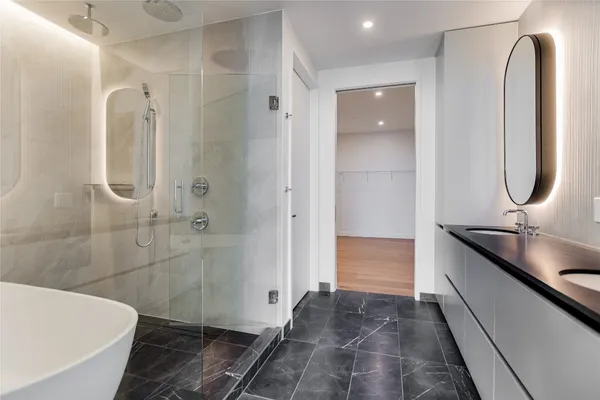 a bathroom with a sink and mirror