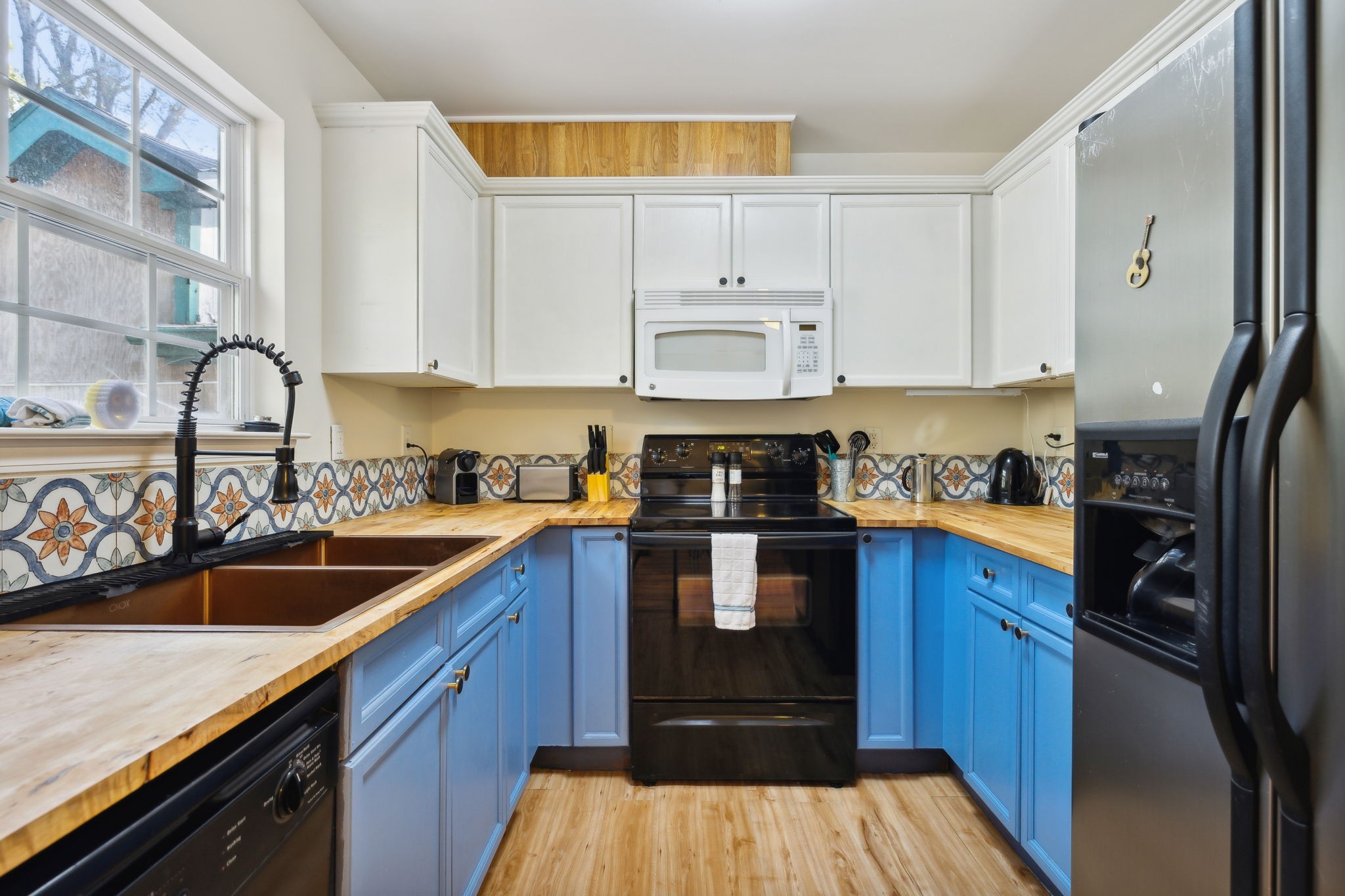 3908 Taylor Road Nashville, TN 37211 - Photo 13 of 42 a kitchen with a sink a stove and cabinets