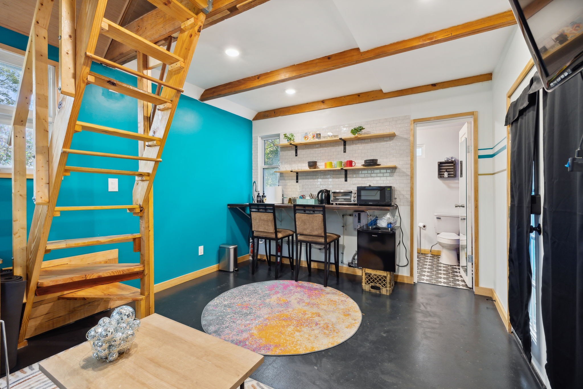 3908 Taylor Road Nashville, TN 37211 - Photo 29 of 42 a room with wooden floor and furniture