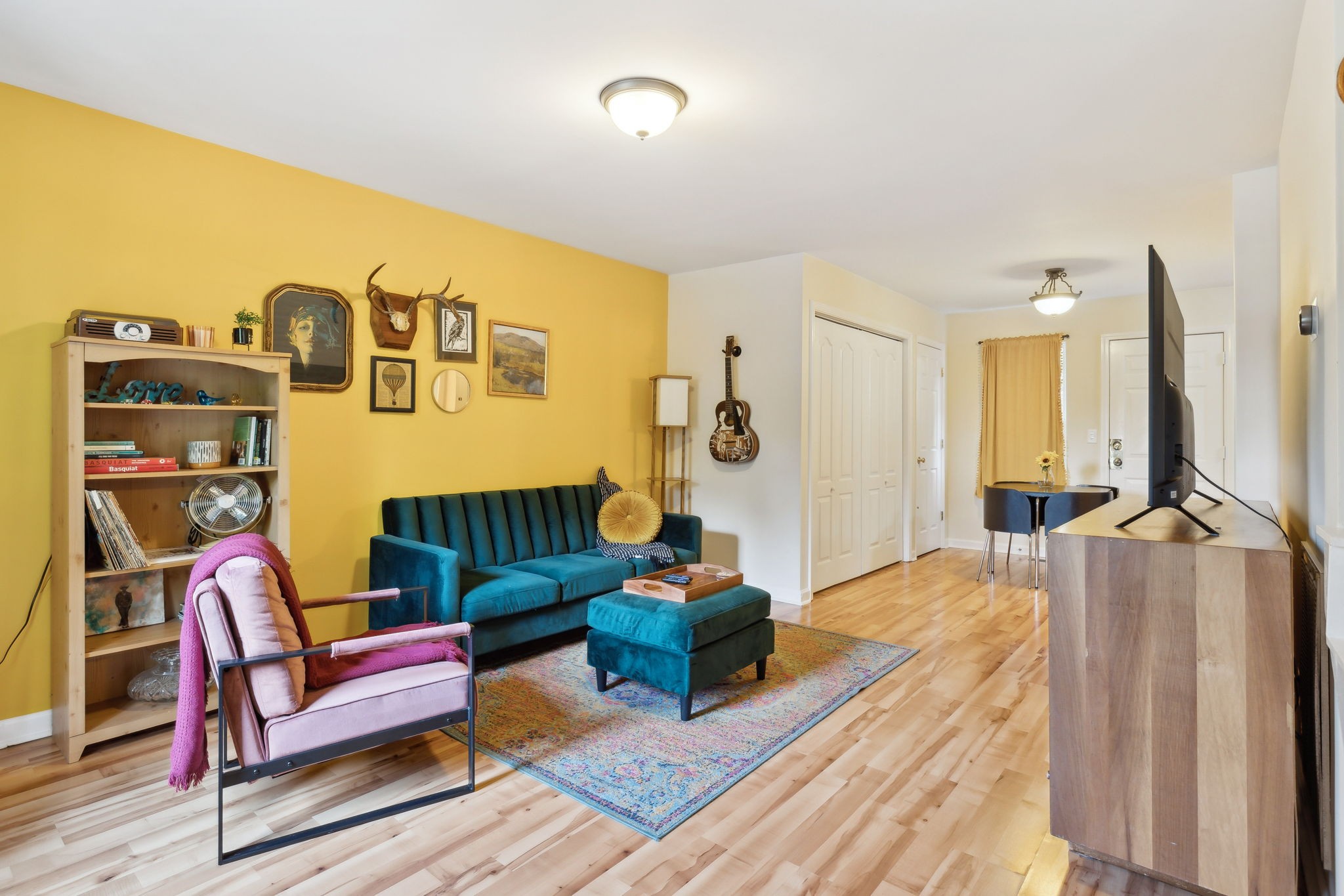 3908 Taylor Road Nashville, TN 37211 - Photo 4 of 42 a living room with furniture a flat screen tv and a table