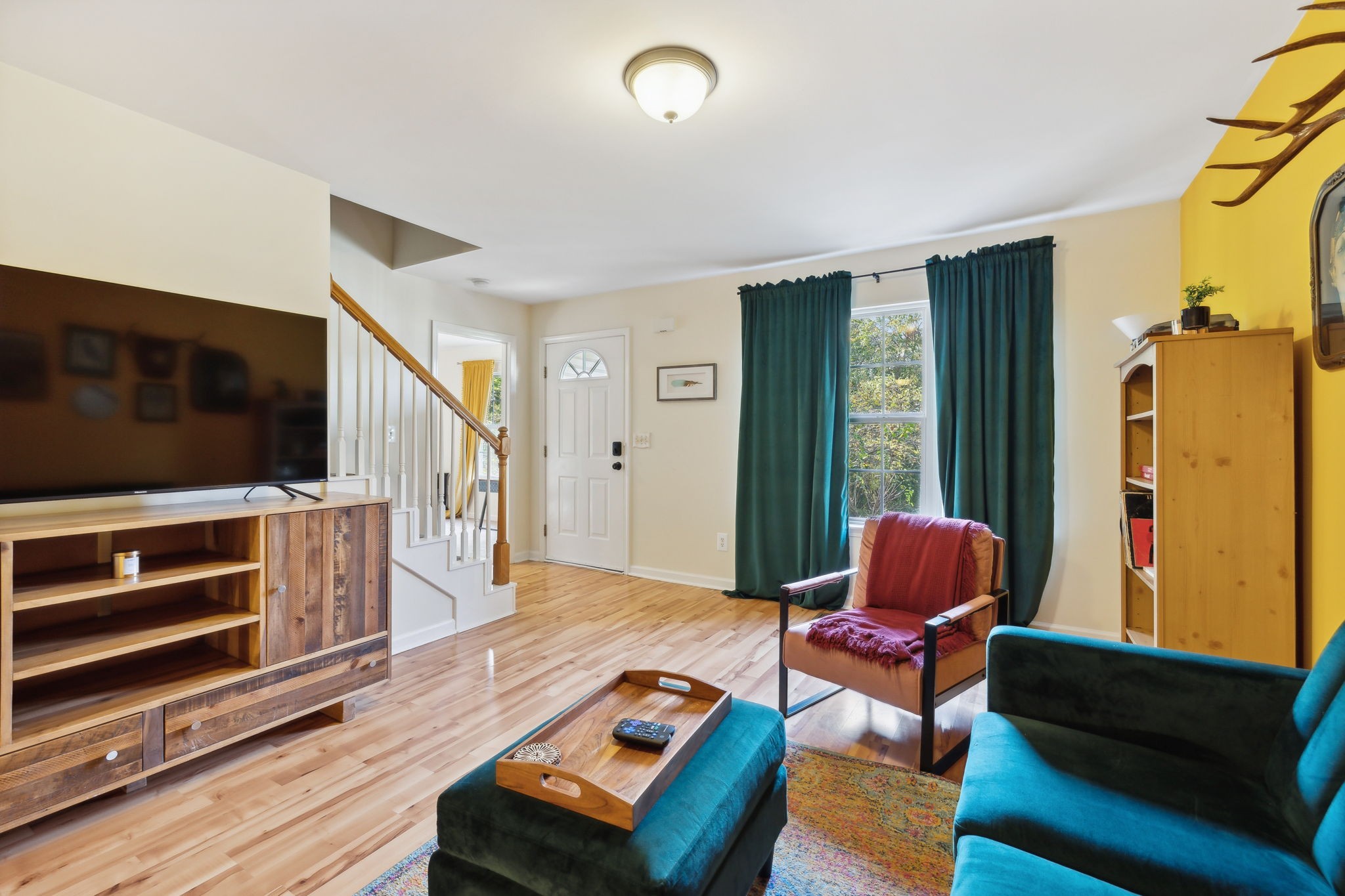 3908 Taylor Road Nashville, TN 37211 - Photo 8 of 42 a living room with furniture and a flat screen tv