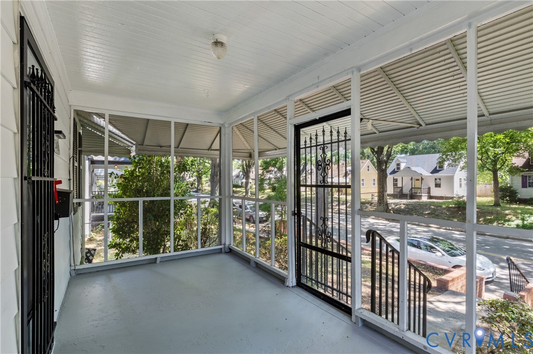3406 Meadowbridge Road Richmond, VA 23222 - Photo 2 of 12 Screened porch featuring a beadboard ceiling and a