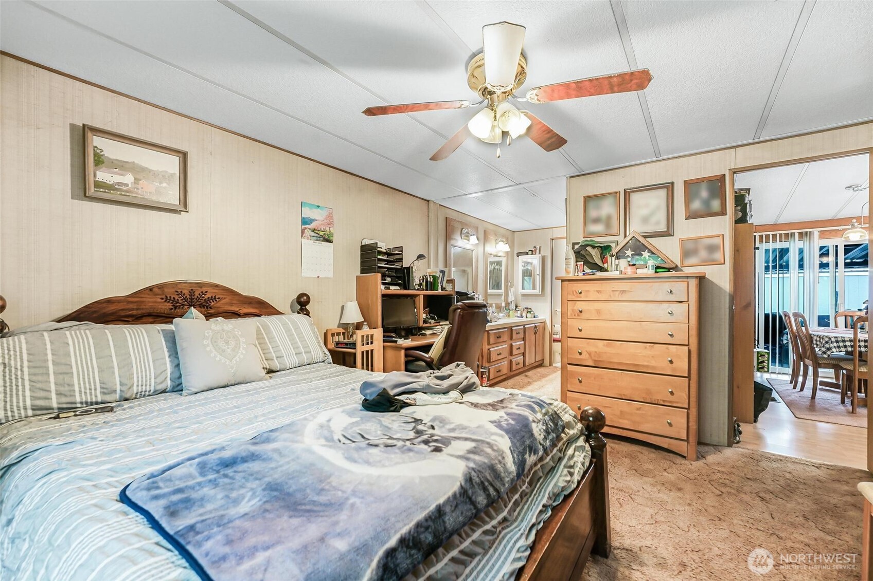 980 South Falcon Road Camano Island, WA 98282 - Photo 13 of 30 a bedroom with a bed and ceiling fan