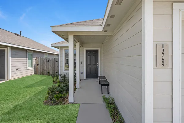 a view of a back yard of the house