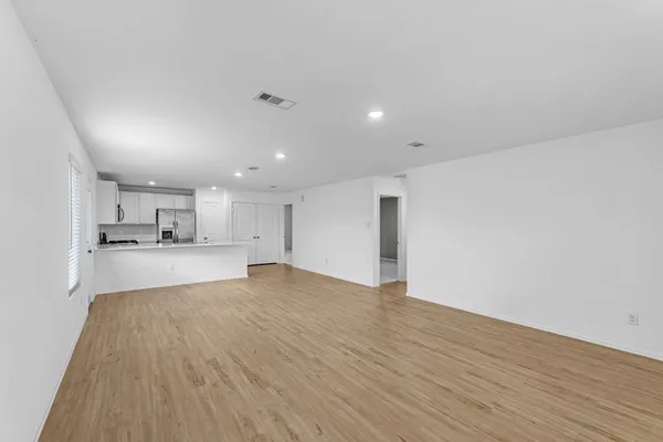 a view of kitchen with wooden floor