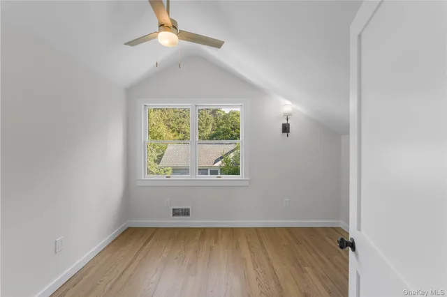 a view of a lake with a big yard