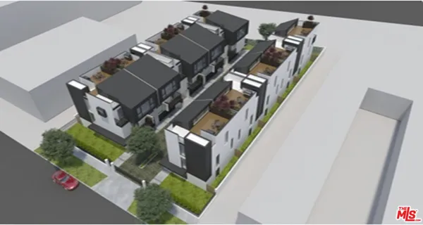 an aerial view of a house with a garden