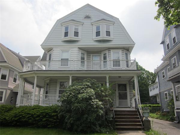 172 Powder House Boulevard Somerville, MA 02144 - Photo 2 of 3 a front view of a house with plants