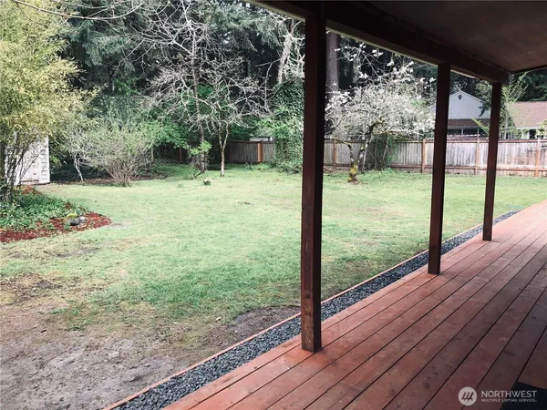 a view of a yard from a balcony
