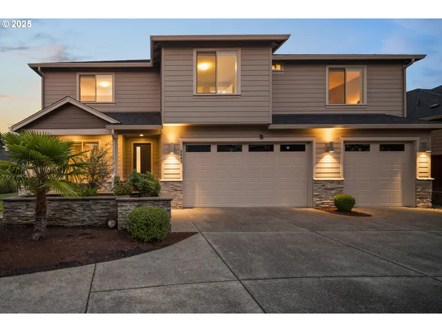 a view of a building with potted plants