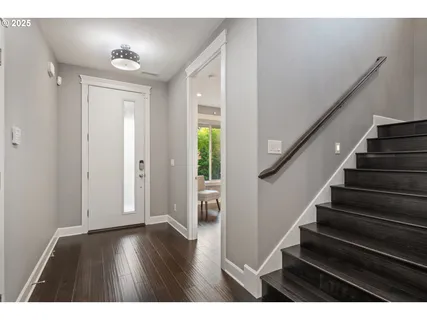 a view interior of a house with wooden floor and stairs
