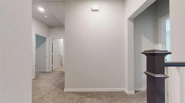a view of a hallway with closet
