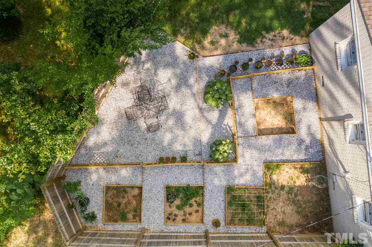 1001 Caspan Street Raleigh, NC 27610 - Photo 23 of 30 an aerial view of a house with a yard