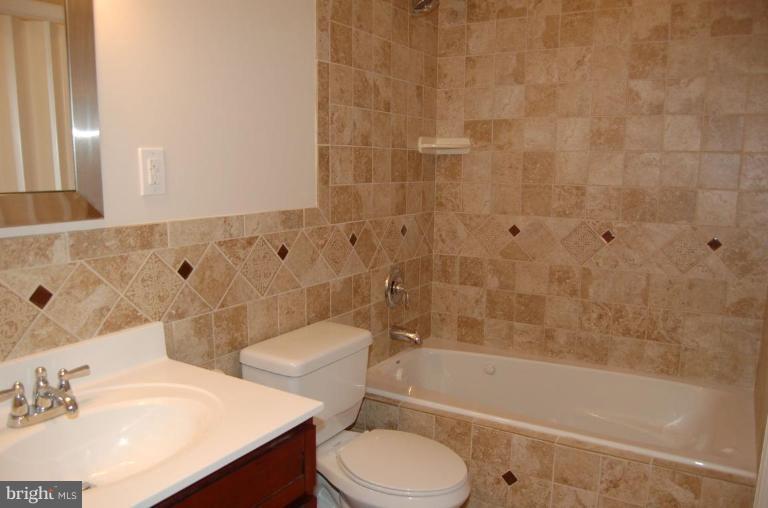 818 L Street Northeast Washington, DC 20002 - Photo 13 of 19 basement apt. full bathroom