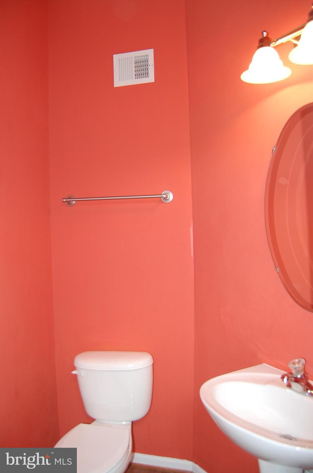 183 Riparian Lane Ranson, WV 25438 - Photo 3 of 22 Convenient half-bath upon entering main level
