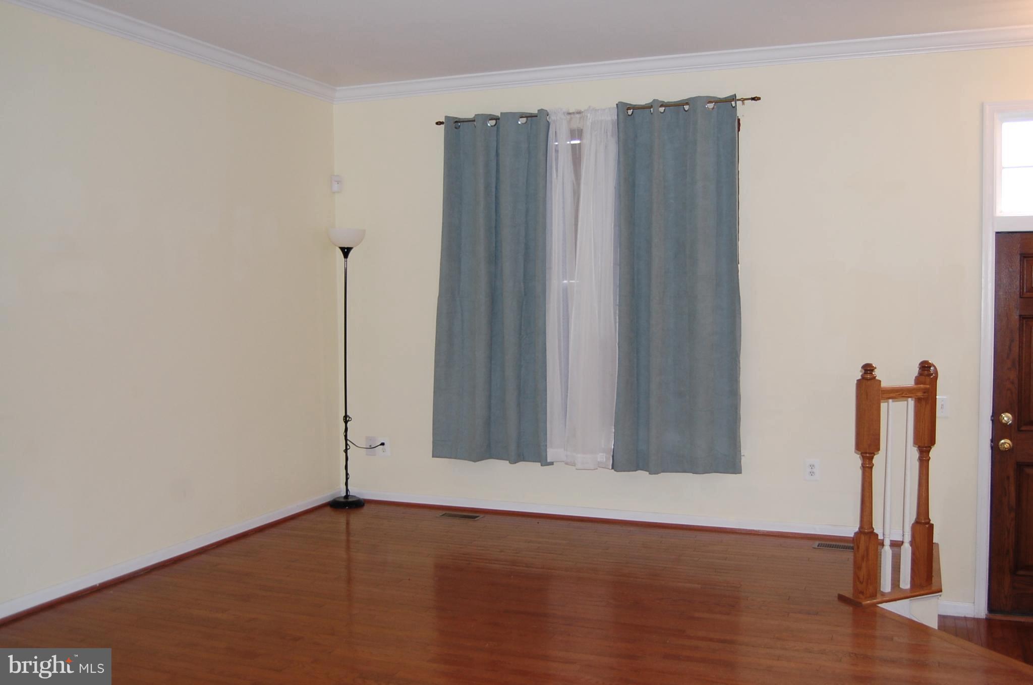183 Riparian Lane Ranson, WV 25438 - Photo 4 of 22 Large front window & wood floors on 1st level