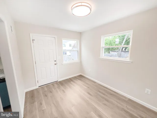 an empty room with windows