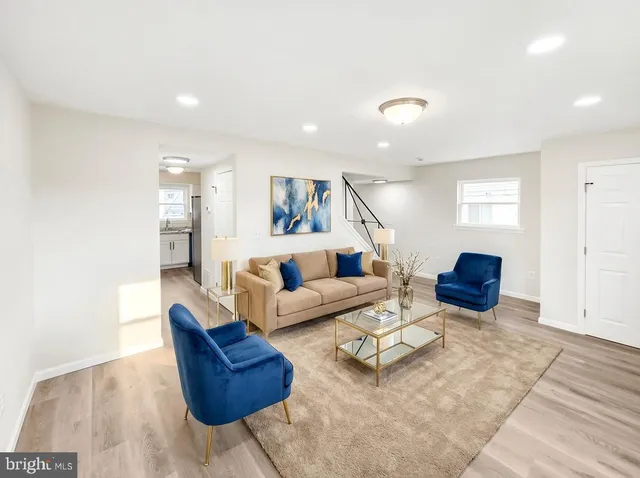 a living room with furniture and a couch