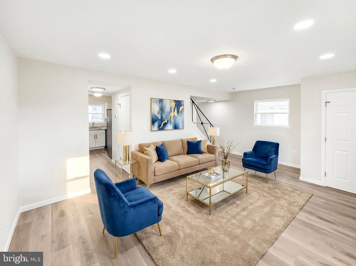 6516 Columbia Park Road Landover, MD 20785 - Photo 6 of 25 a living room with furniture and a couch