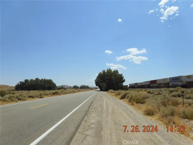 a view of a room with a flat screen tv