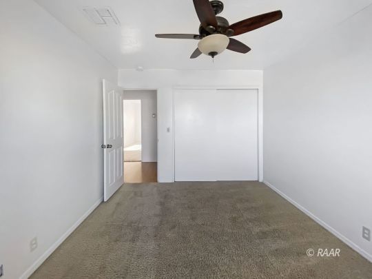 332 North Fairview Street Ridgecrest, CA 93555 - Photo 8 of 16 a view of an empty room and window