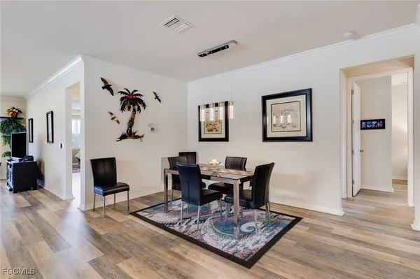 a view of a livingroom with furniture and a table
