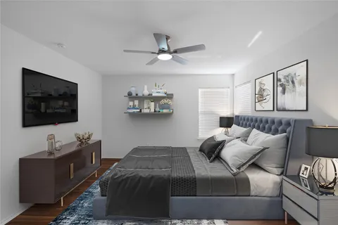 a white toilet sitting next to a bathroom sink
