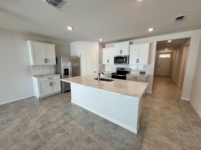 490 Seaspray Drive Fort Pierce, FL 34945 - Photo 12 of 21 Kitchen