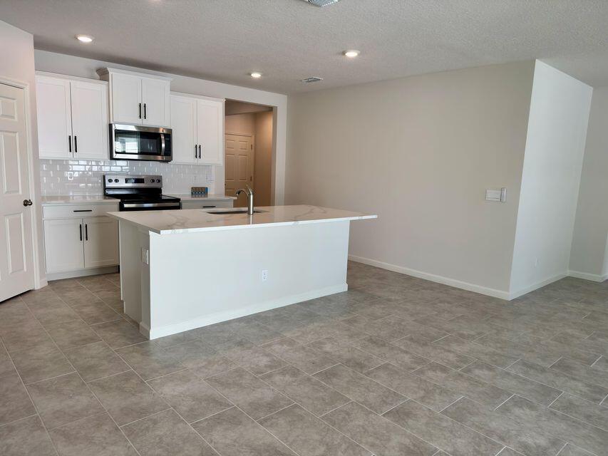 490 Seaspray Drive Fort Pierce, FL 34945 - Photo 13 of 21 Kitchen