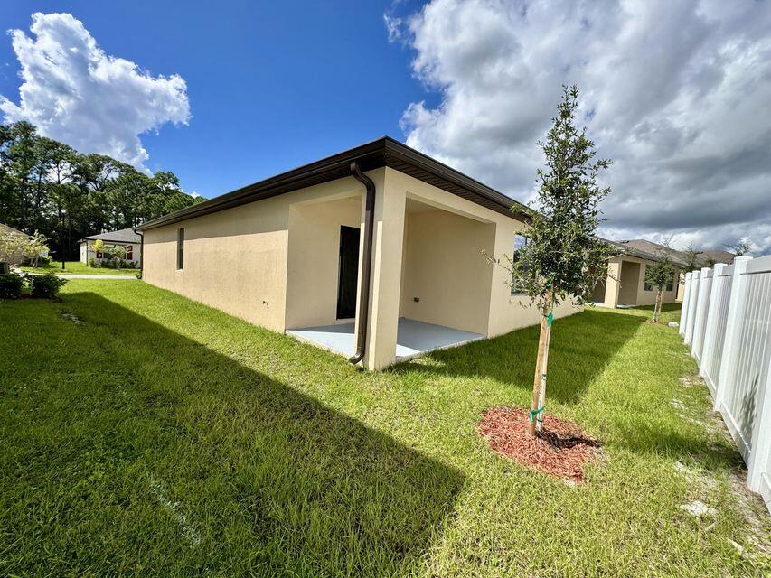 490 Seaspray Drive Fort Pierce, FL 34945 - Photo 20 of 21 Backyard