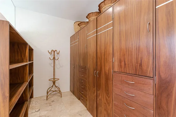 an outdoor living space with patio furniture and a potted plants