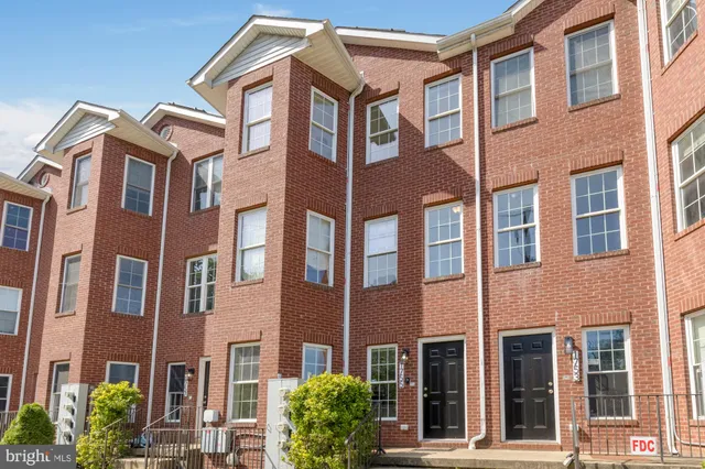 a front view of a multi story building