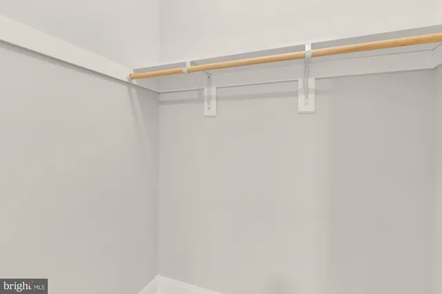 a view of an empty walk in closet