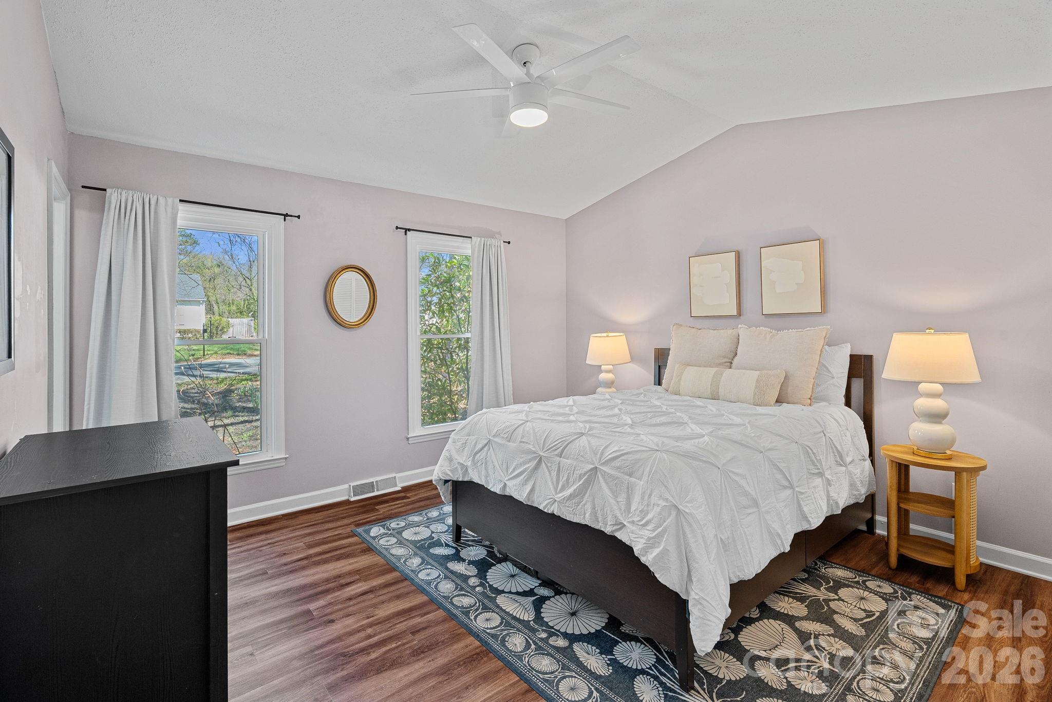 5236 Auburndale Road Charlotte, NC 28205 - Photo 12 of 26 a bedroom with a bed and a window