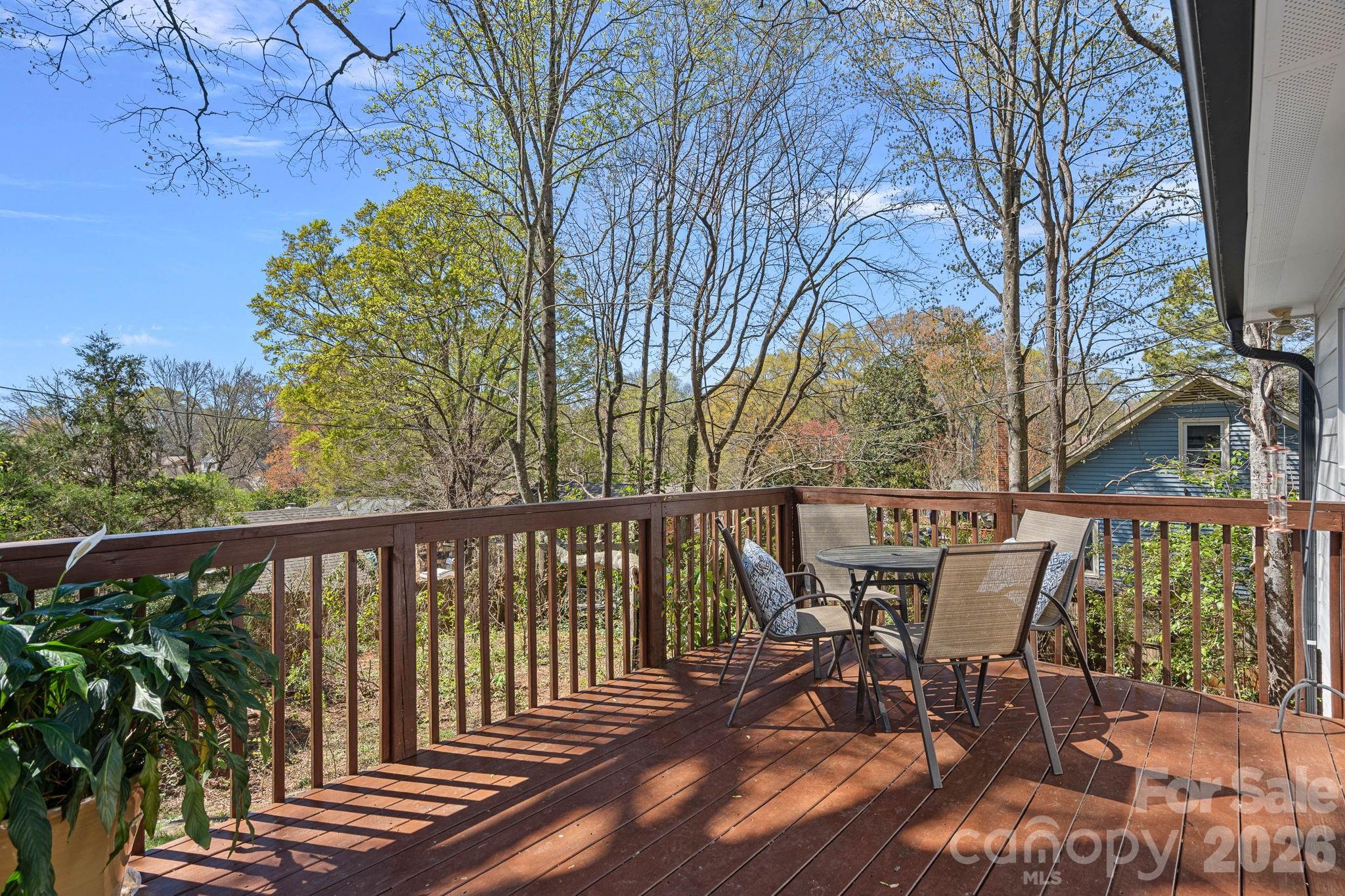 5236 Auburndale Road Charlotte, NC 28205 - Photo 20 of 26 a view of a chairs and table in the balcony