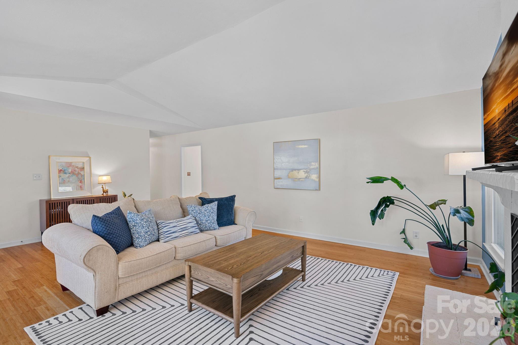 5236 Auburndale Road Charlotte, NC 28205 - Photo 4 of 26 a living room with furniture a rug and a window
