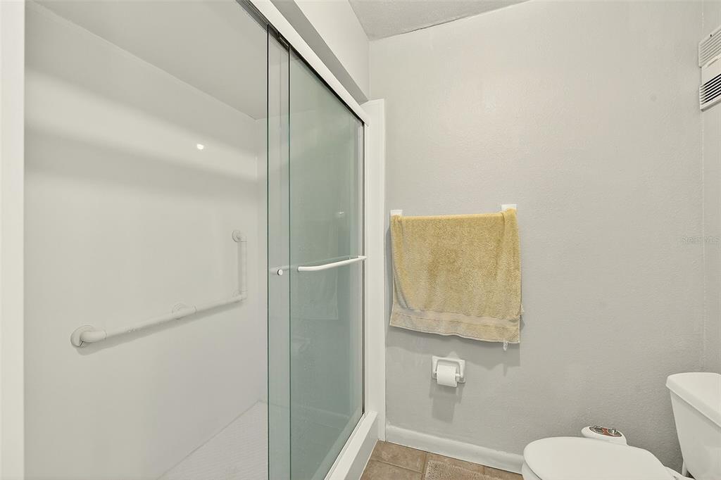700 Starkey Road, Unit 1216 Largo, FL 33771 - Photo 19 of 32 a bathroom with a toilet